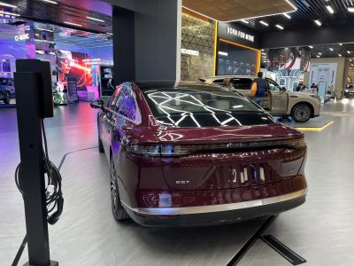 Rear view with continuous LED taillights and AWD badge