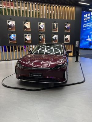 Front view of a sleek modern SUV with prominent lighting design