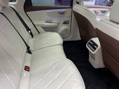 Rear seat luxury interior with quilted leather and ambient lighting