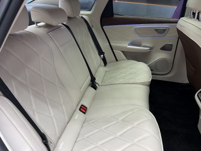 Luxury rear seat with quilted leather and ambient lighting