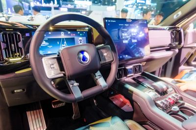 Modern digital dashboard and large touchscreen display in car interior