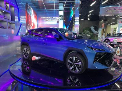 Side profile of a futuristic electric SUV with modern alloy wheels and bold angular design.