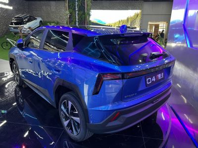 Sleek rear design with sharp angles and LED tail lights on modern blue SUV