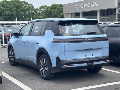 Rear of electric SUV with full-width LED taillights and modern aerodynamic design