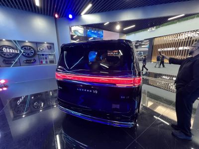 Rear view with LED tail light strip and sleek modern design