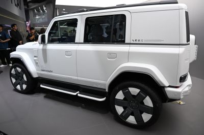 Boxy SUV design with large two-tone wheels and modern side profile