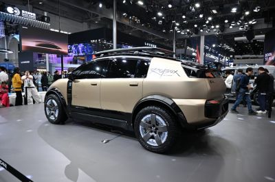 Modern SUV with rugged off-road tires and roof rack