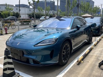 Sleek electric luxury sedan with aerodynamic styling and LED headlights.