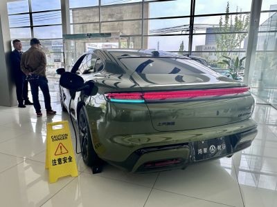 Electric vehicle rear design with charging port and LED taillights