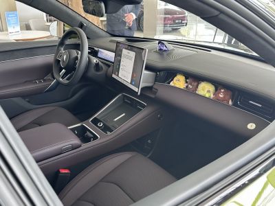 Dual digital displays and plush dashboard with decorative stuffed toys