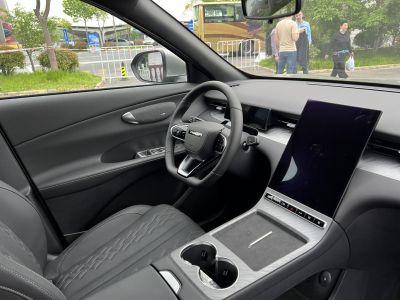 Digital dashboard and large vertical touchscreen in modern car interior