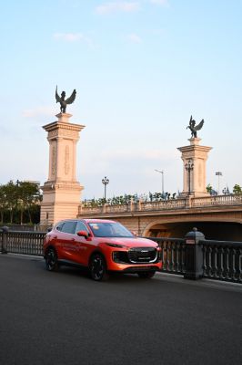 SUV with bold front grille and LED headlights in urban environment