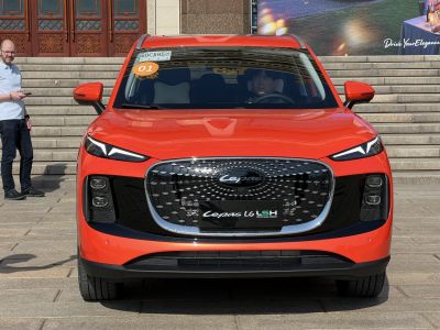 Front view with distinctive grille and sharp LED headlights