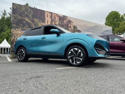 Aerodynamic electric crossover with futuristic alloy wheels
