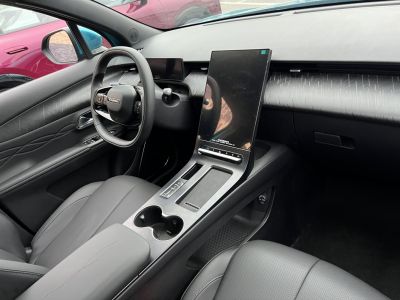 Digital dashboard and large vertical touchscreen in modern car interior