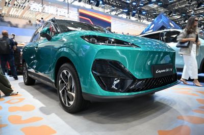 Futuristic EV front fascia with sharp LED headlights and aerodynamic design
