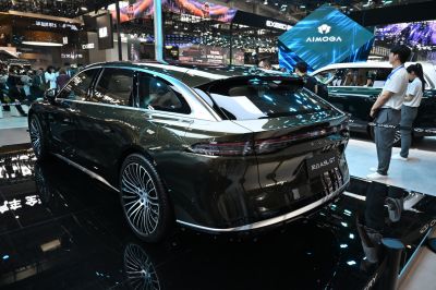 Sleek rear design and multi-spoke alloy wheels on luxury wagon