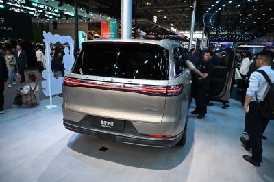 Rear view showcasing LED tail light strip and large rear window