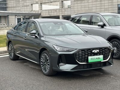 Sleek front view with hexagonal grille and LED headlights