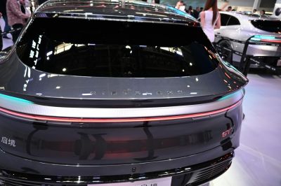 Sleek rear with continuous LED light strip and glossy finish