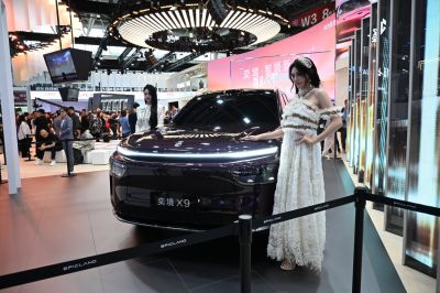 Futuristic front design with continuous LED light strip and smooth aerodynamic hood
