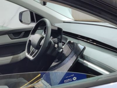 Dual digital displays and modern dashboard in car interior