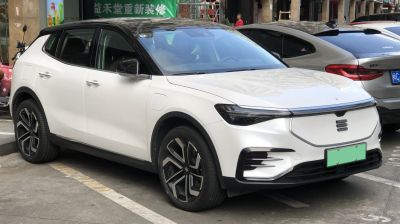 Sleek electric SUV with LED light bar and geometric alloy wheels