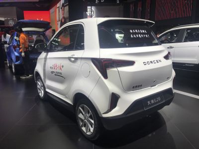 Rear view of a compact electric hatchback with modern taillights and a clean design.
