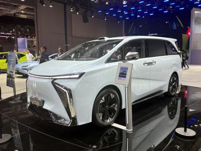 Futuristic electric MPV with LED lights and aerodynamic shape
