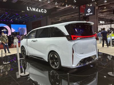 White MPV with futuristic rear lights and black rear window