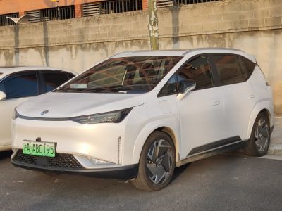 Modern electric SUV front and side view with sleek lines and futuristic headlights
