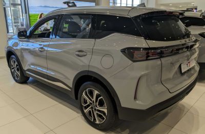 Rear-side view of SUV with sleek taillights and alloy wheels