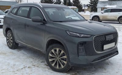 Modern SUV with bold front grille and sleek LED headlights