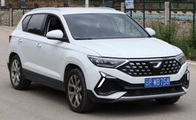 Front grille and LED headlights of a modern SUV