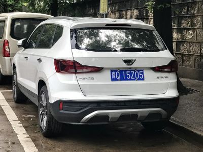 Rear view of a white compact SUV with angular tail lights and modern styling