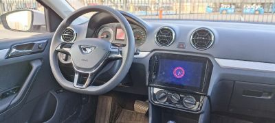 Steering wheel, dashboard gauges, infotainment system and air vents