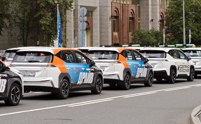 Rear and side views of electric SUVs in two-tone livery