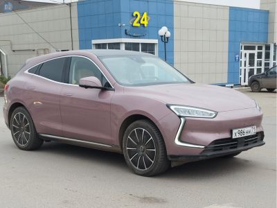 Modern hatchback with LED headlights and unique curved front lights