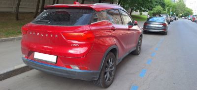 Rear view with distinct tail lights and sporty rear profile