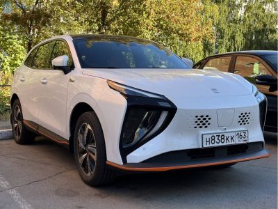 Futuristic front fascia with unique headlights and hexagonal grille pattern