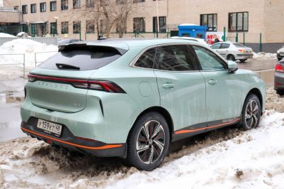 Rear side view with distinctive taillights and alloy wheels