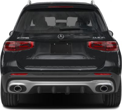 Rear view with AMG badges, dual exhaust, and rear diffuser