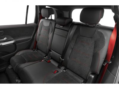 Rear seats with black upholstery, red stitching, and red seat belts