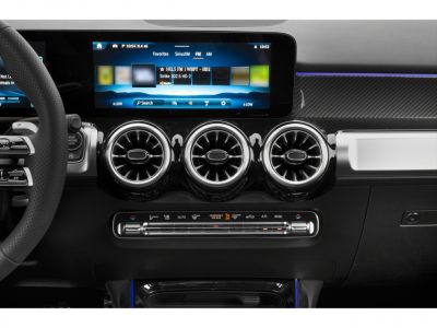 Widescreen digital display and triple circular air vents on dashboard
