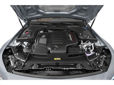 AMG engine bay with detailed engine cover and components