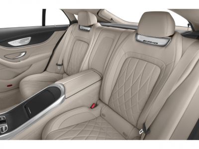 Quilted beige leather rear seats with AMG branded headrests and center armrest console.