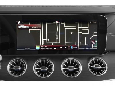 Infotainment screen with navigation and turbine-style air vents