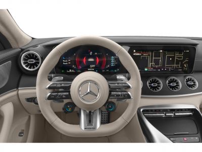 Beige AMG steering wheel with digital dashboard and widescreen displays