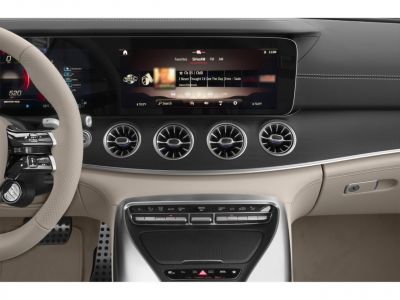 Digital dashboard with four round air vents and premium interior controls