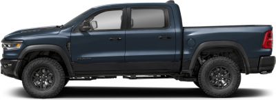 Side profile of quad cab pickup with short bed and offroad tires